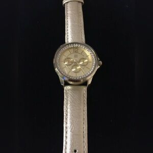 NY and Company Gold band  Watch surrounded by Crystals.